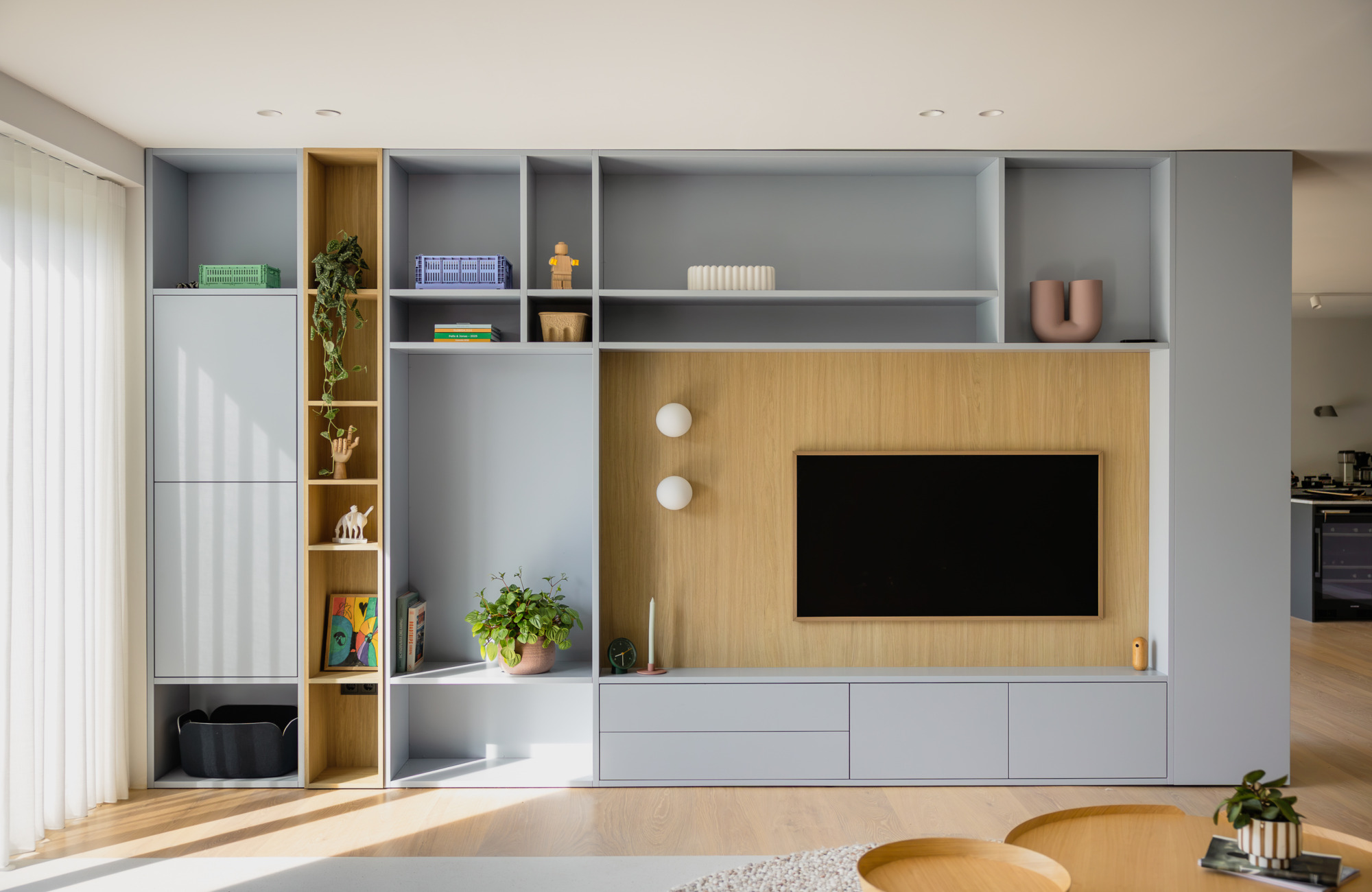 Interieurfotografie woonkamer Maarn — overzicht van woon- en eethoek
